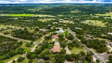 This Mediterranean-style Hill Country residence sits on more - photo 31