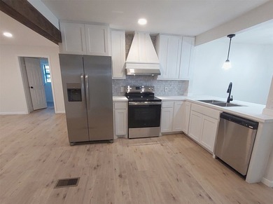 Move in or Investment Ready Lake Home with views of the lake! - photo 10