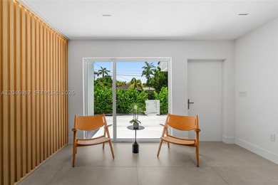 Step into this tastefully fully renovated 4 bedroom, 3.5 - photo 8