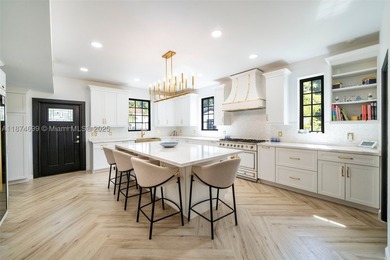 Exquisitely & completely renovated with no expense spared, this - photo 13
