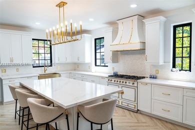 Exquisitely & completely renovated with no expense spared, this - photo 17