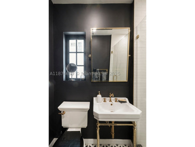 Exquisitely & completely renovated with no expense spared, this - photo 25