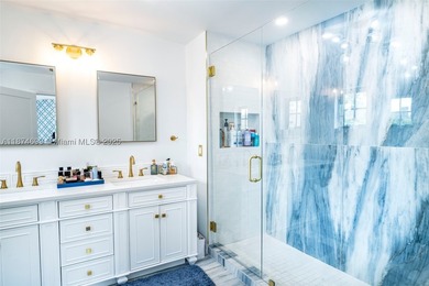 Exquisitely & completely renovated with no expense spared, this - photo 29