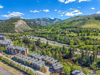 Experience elevated mountain living at Riverfront Townhomes - photo 34