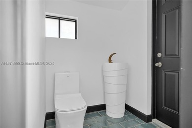 Exquisitely & completely renovated with no expense spared, this - photo 35