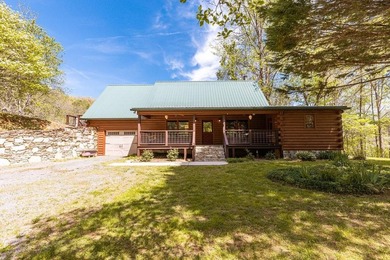 Set on 27.4 acres of rolling pasture and mountain-view land, 440 - photo 1
