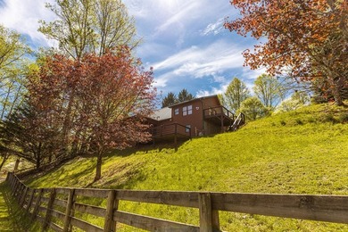 Set on 27.4 acres of rolling pasture and mountain-view land, 440 - photo 5