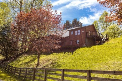 Set on 27.4 acres of rolling pasture and mountain-view land, 440 - photo 7