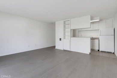 Don't miss this ground level studio condo with inside view of - photo 2