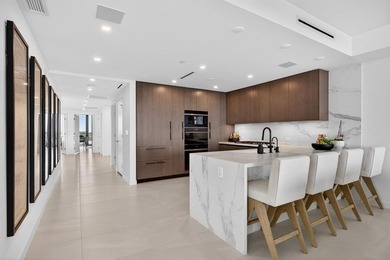 Stunning Southeast corner beachfront residence at Solemar with a