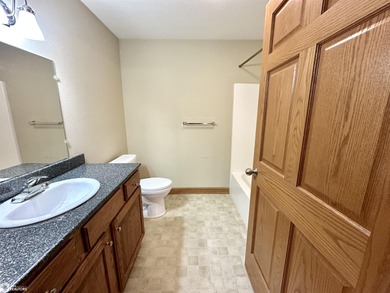 This bright second-floor condo offers comfortable living with