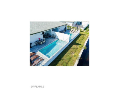 Gorgeous duplex on a Gulf Access canal! 6 bedrooms, 4 full - photo 15