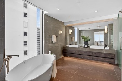 Stunning Southeast corner beachfront residence at Solemar with a