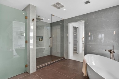 Stunning Southeast corner beachfront residence at Solemar with a