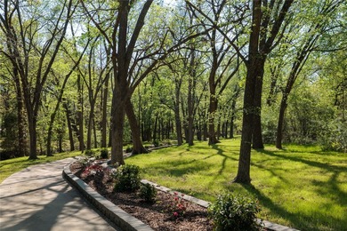 This landmark property, nestled on 35 landscaped acres within - photo 27