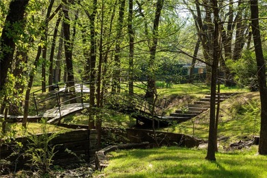 This landmark property, nestled on 35 landscaped acres within - photo 28