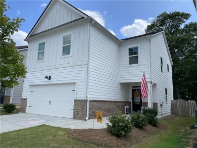 Lake Home For Sale in Flowery Branch, Georgia