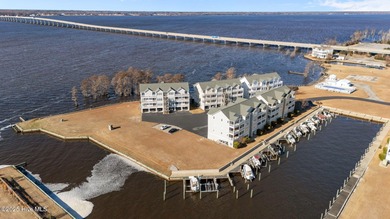 This peaceful, waterfront condo brings you straight into the
