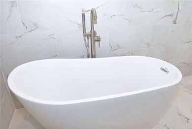 Beautifully renovated 2-bedroom, 2-bath corner residence on the - photo 23