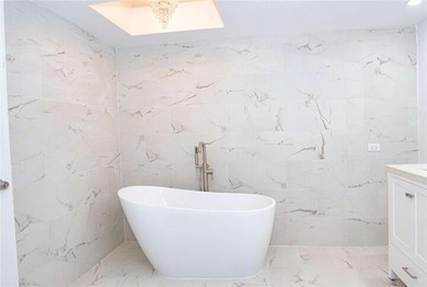 Beautifully renovated 2-bedroom, 2-bath corner residence on the - photo 24