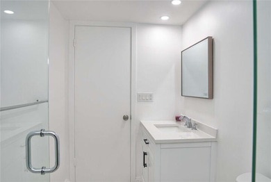 Beautifully renovated 2-bedroom, 2-bath corner residence on the - photo 32