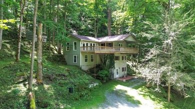 Mountain Retreat in Glenville, NC!! Tucked away in the serene - photo 4