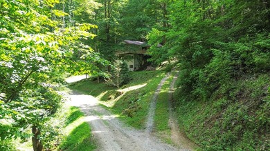 Mountain Retreat in Glenville, NC!! Tucked away in the serene - photo 6