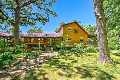 Tucked into the rolling hills of the Ozarks, with private - photo 1