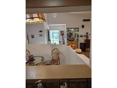 Spacious 3 Bedroom 2 Bath residence in 55+ community. Open Floor - photo 5