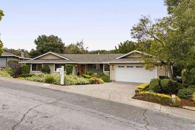 Set on a peaceful cul-de-sac, this inviting home pairs beautiful - photo 2