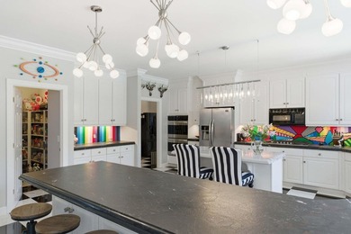 This stately home in Coosaw Creek Country Club is located on a - photo 13