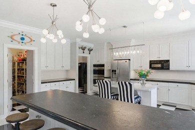 This stately home in Coosaw Creek Country Club is located on a - photo 14