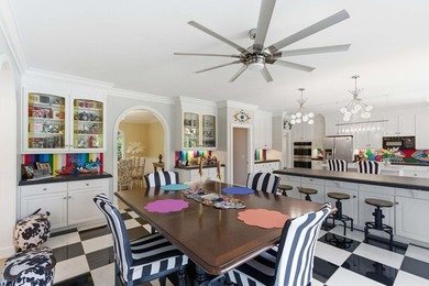 This stately home in Coosaw Creek Country Club is located on a - photo 15