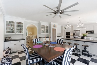 This stately home in Coosaw Creek Country Club is located on a - photo 16