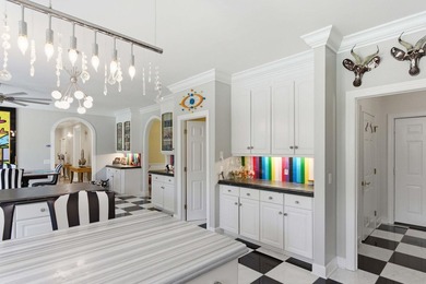 This stately home in Coosaw Creek Country Club is located on a - photo 17