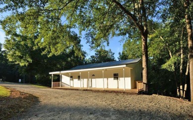 Lots of space. Two bedrooms and full bath on main level along SO - Lake Home SOLD! in Eatonton, Georgia