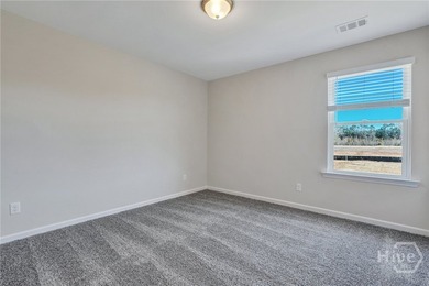 The Cypress floorplan by Smith Family Homes is under - photo 24