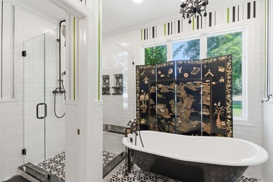 This stately home in Coosaw Creek Country Club is located on a - photo 32