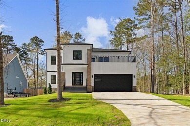 Stunning modern new construction in the gated lake community of - photo 4