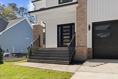 Stunning modern new construction in the gated lake community of - photo 5