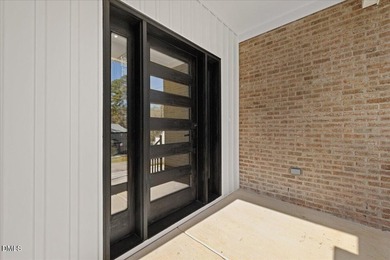 Stunning modern new construction in the gated lake community of - photo 9