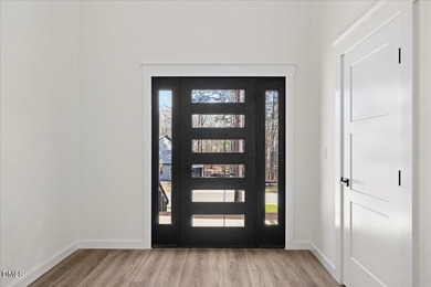 Stunning modern new construction in the gated lake community of - photo 10