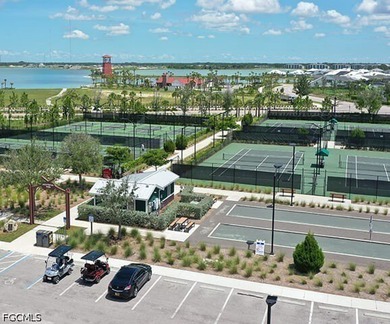 Enjoy a free golf cart with home purchase! This exceptional - photo 32