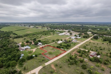 0.57-acre L-shaped lot located just south of Lake Brownwood. The - photo 4