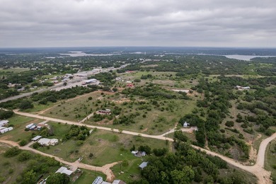 0.57-acre L-shaped lot located just south of Lake Brownwood. The - photo 5