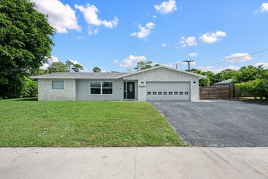Rare opportunity in the desirable Palm Beach National Golf & - photo 1