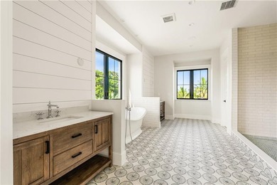 This newly completed coastal retreat offers a rare architectural - photo 30