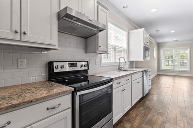 Introducing this inviting 2BR/2BA home located in the desirable - photo 11