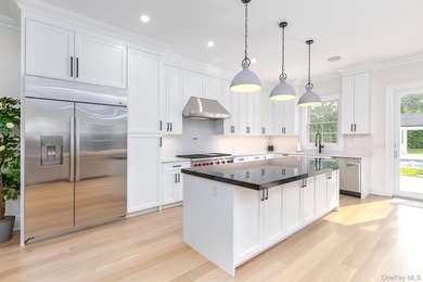 Discover refined Hamptons living in this newly completed - photo 10