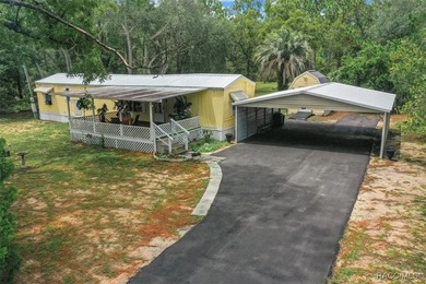 Welcome to this charming 2-bedroom, 1.5-bath single wide - photo 1